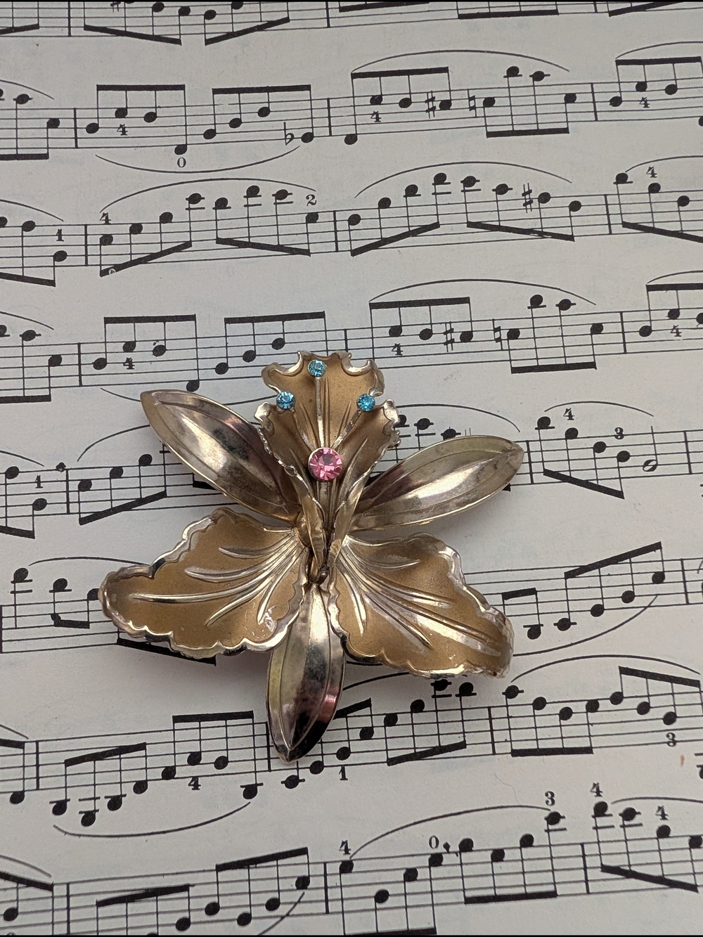 Vintage Orchid Floral Metal Accent Brooch with Pink and Blue Rhinestones